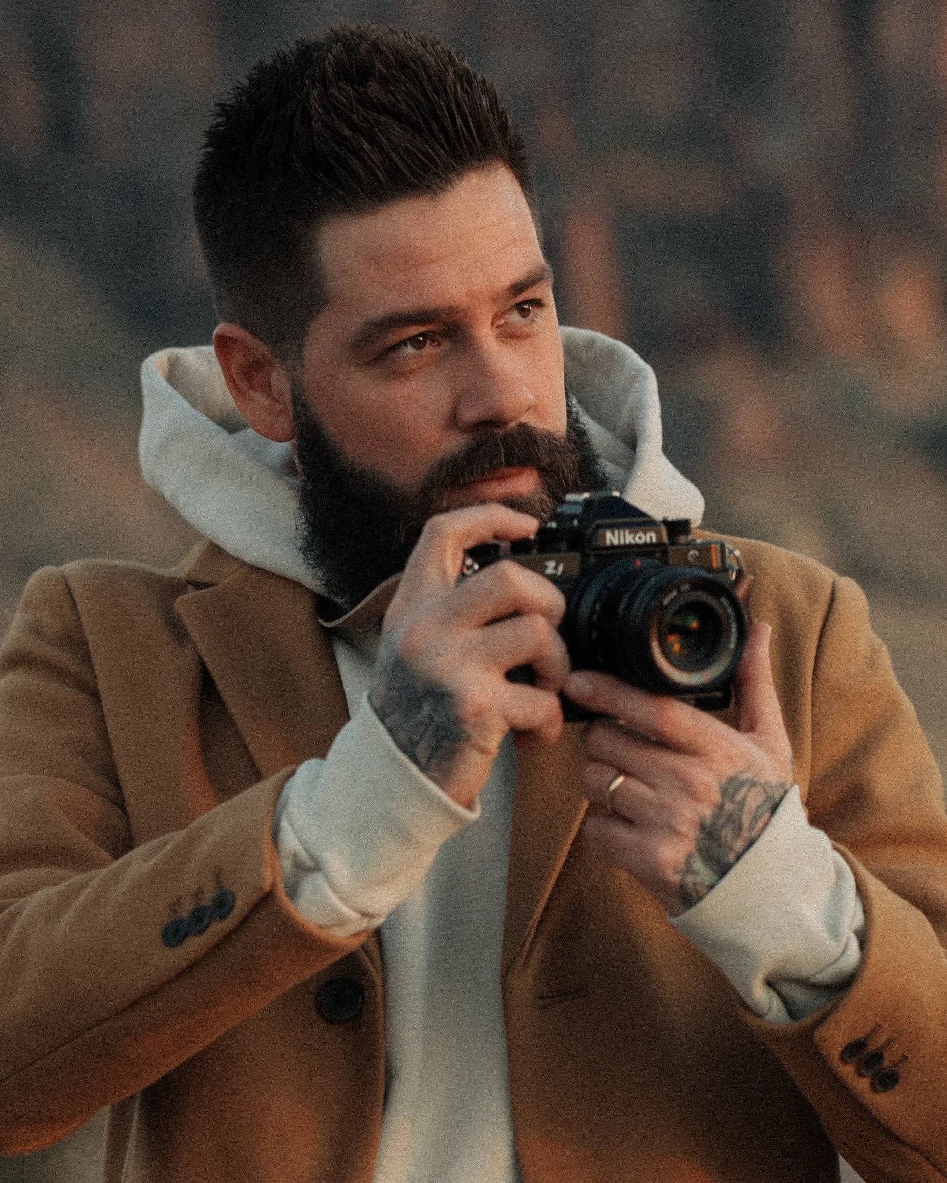 Brett Hill holding a camera